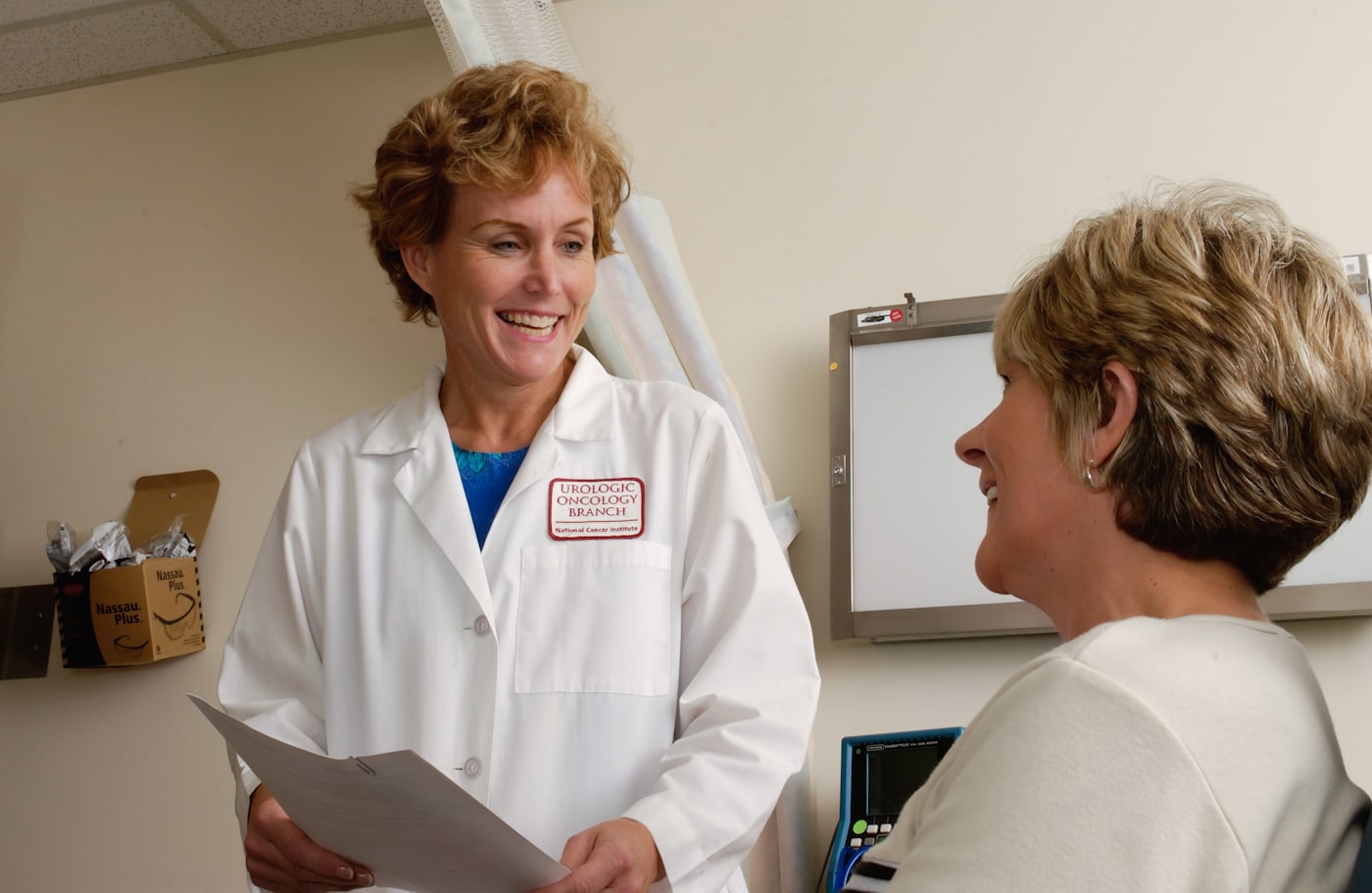 Doctor speaking with a patient after a booked appointment