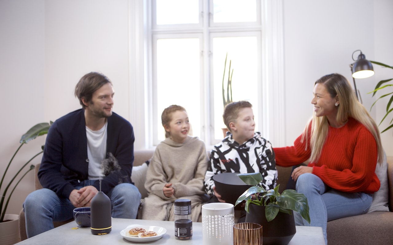 Insurance agent meeting with a family at home