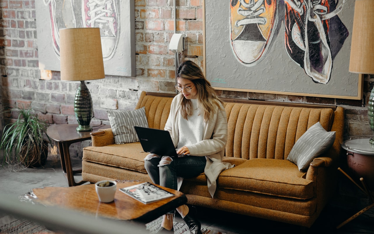 A prospect comparing insurance quotes on a laptop