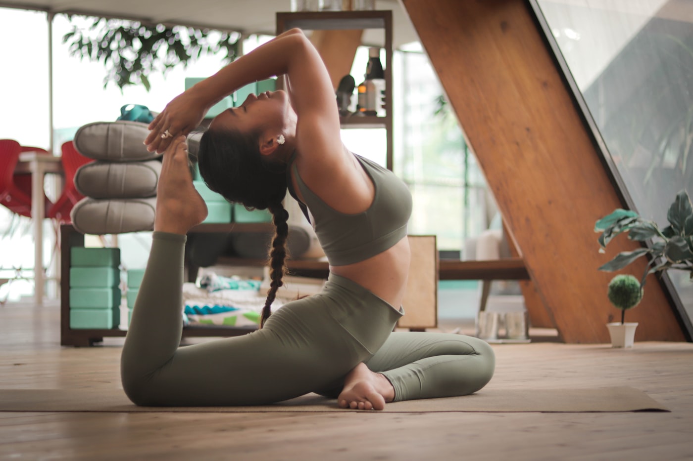 Student in a yoga studio after booking a class